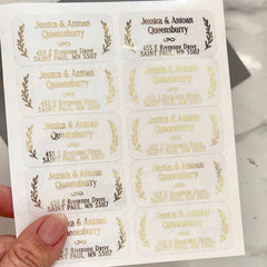 XOXOKristen sheet of personalized address labels with laurel leaf accents, available in black ink, gold foil, rose gold foil, and silver foil finishes - XOXOKristen